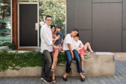 Young Interracial International Blended Family in Front of Modern Home by San Francisco Family Photographer